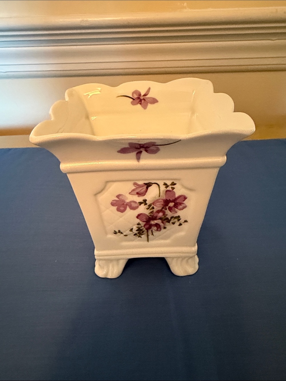 White Ceramic Floral Planter with Purple Blossoms